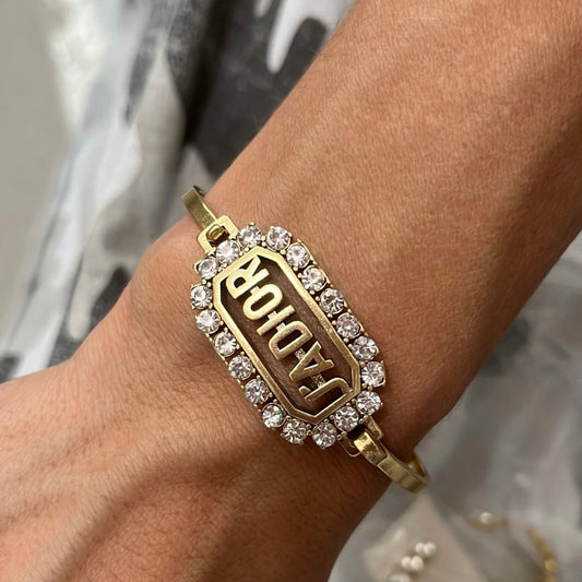 Rigid bracelet with stones