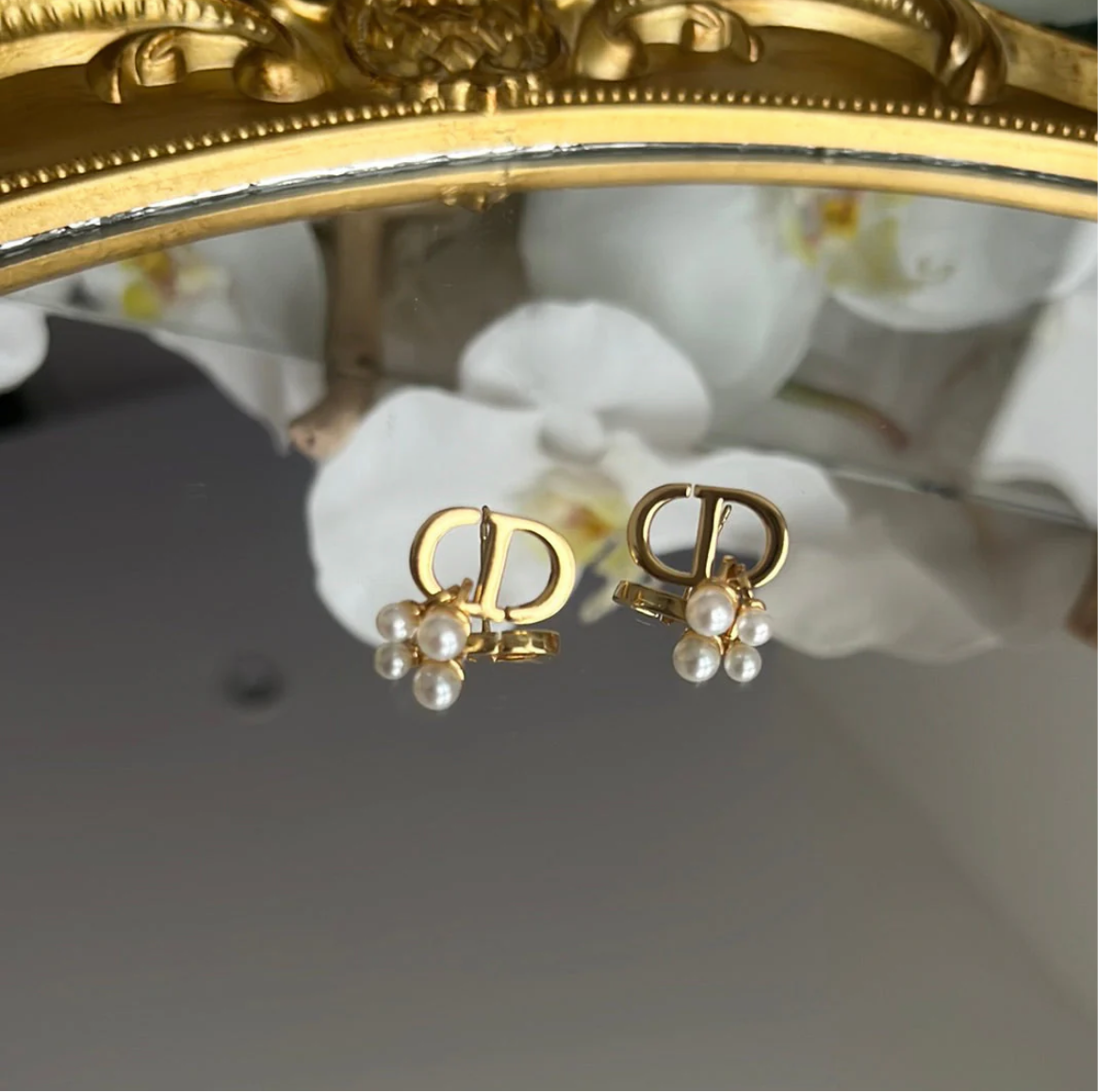 Gold Dangling Pearl earrings