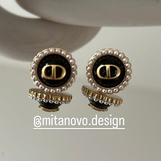 Round black pearl earrings