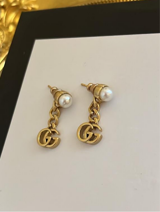 Gold dangling earrings