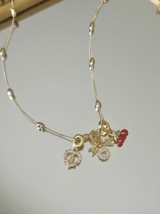 Gold Necklace with chams